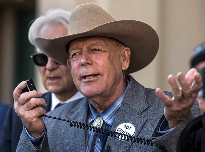 FILE - In this Jan. 10, 2018 file photo, Cliven Bundy talks to reporters outside Las Vegas Metropolitan Police Headquarters in Las Vegas. The 9th U.S. Circuit Court of Appeal in San Francisco on Thursday, Aug. 6, 2020, denied prosecutors&#039; efforts to overturn U.S. District Judge Gloria Navarro&#039;s decision to stop a months-long trial in January 2018 due to prosecutorial misconduct and her order dismissing the case so it could not be re-filed. 