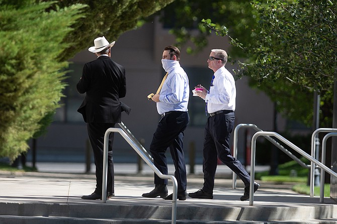 From left, State Senator James Settelmeyer, Nevada Senate GOP Executive Director Greg Bailor and Senator Keith Pickard return to the the Legislature during a recess on Monday, Aug. 3, 2020 on the third day of the 32nd Special Session in Carson City. (David Calvert/Nevada Independent)