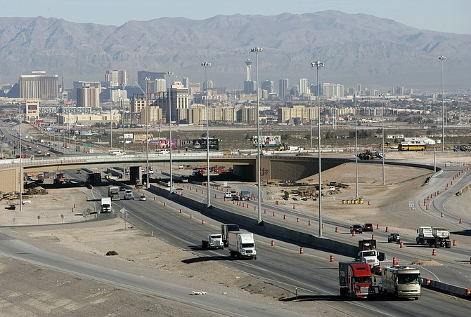 FILE - In this Feb. 12, 2008, file photo, traffic moves along Interstate 15 in Las Vegas. Artificial intelligence is helping improve safety along a stretch of Las Vegas&#039; busiest highways. (AP Photo/Jae C. Hong, file)
