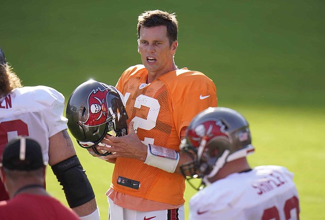 Tampa Bay Buccaneers quarterback Tom Brady (12) during an NFL football training camp practice Friday, Aug. 28, 2020, in Tampa, Fla. 