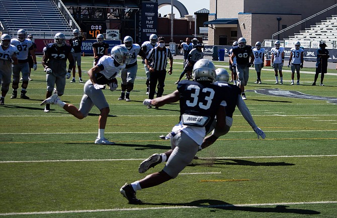 Nevada football players during a scrimmage Aug. 8 at Mackay Stadium.
