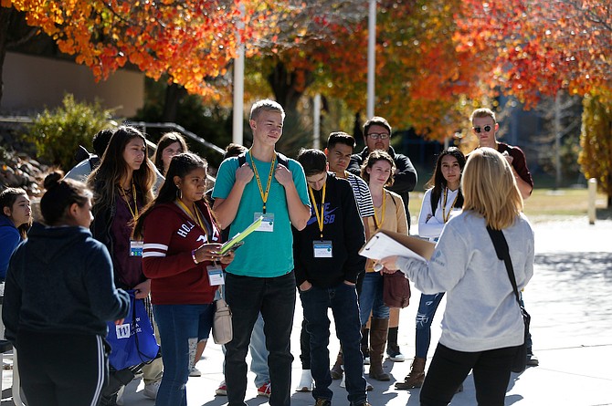 Foundation Director Niki Gladys gives a tour to a group of high school seniors from around the region during in a Nevada Promise Work Day at Western Nevada College, in Carson City, Nev., on Thursday, Nov. 8, 2018. Nevada Promise is a scholarship and mentoring program for Nevada high school seniors, making college more accessible to students in the state. The scholarship covers tuition and class fees and will save families more than $3,000 per year. 
Photo by Cathleen Allison/Nevada Momentum