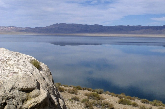 FILE - In this July 29, 2019, file photo, Walker Lake, about 100 miles southeast of Reno, Nev., is viewed. Mineral County and the Walker Lake Working Group announced this week that they intend to bring their legal battle over whether Nevada can adjust already allocated water rights to sustain rivers and lakes long-term back to federal court. 