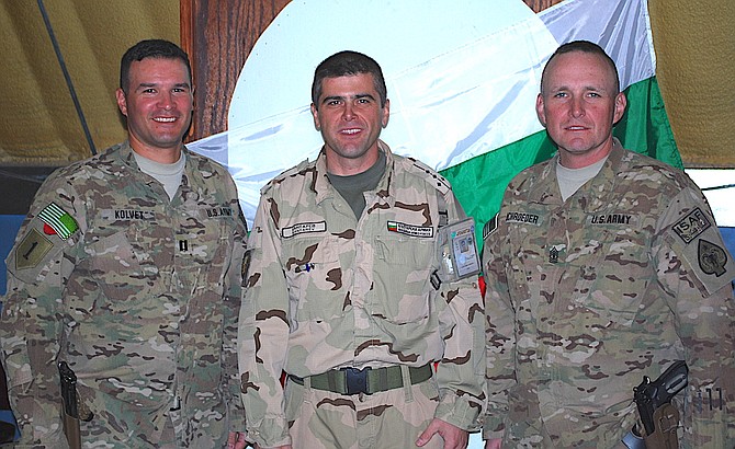 During 2012 and 2013, the 593rd Transportation Co., deployed to Camp Phoenix, Afghanistan. From left are then Capt. Curt Kolvet, commander; a captain with the Bulgarian Army; and 1st Sgt. Harry Schroeder.