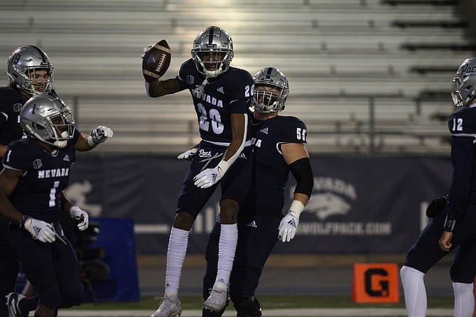 Nevada wide receiver Tory Horton celebrates one of his three touchdown receptions in the Wolf Pack&#039;s win over Fresno State Saturday. 