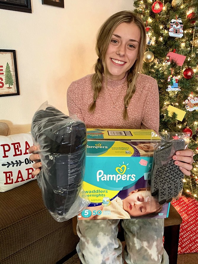 CHS Senior Abby Golik and her Senior Project to provide gloves and socks to both Friends in Service Helping and the Ron Woods Center.
