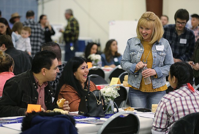 Foundation director Niki Gladys greets guests at the annual Western Nevada College Foundation Scholarship Appreciation &#038; Recognition Celebration in Carson City, Nev., on Friday, March 9, 2018. 
Photo by Cathleen Allison/Nevada Momentum