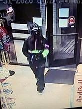 Security footage of a man who robbed the Minden AM/PM on Halloween morning.