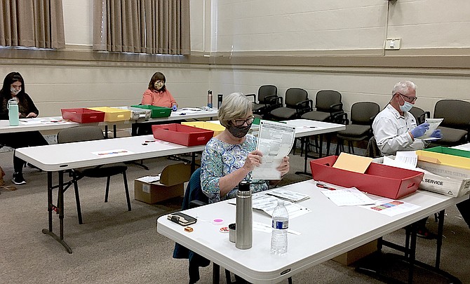 Members of the Douglas County counting board near the end of their task on Thursday afternoon.
