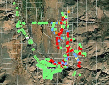 The red dots on the map represent structures that were destroyed in the Mountain View Fire on Tuesday.