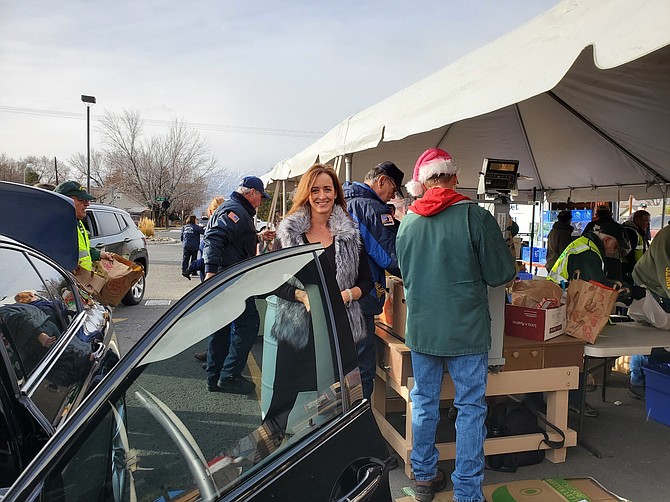 Ginger Easley, donated hundreds of pounds of food to the Carson Valley Food Closet through the KTVN Share Your Holiday food drive event last year. Easley is collecting online donations this year for the food closet.