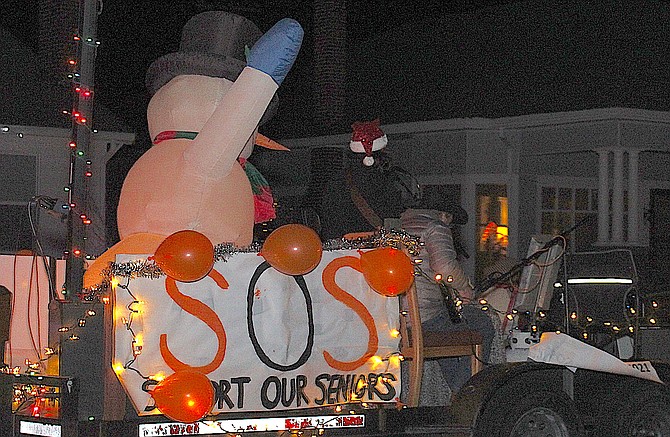 Jakota Waas performs on the Support Our Seniors float last weekend.