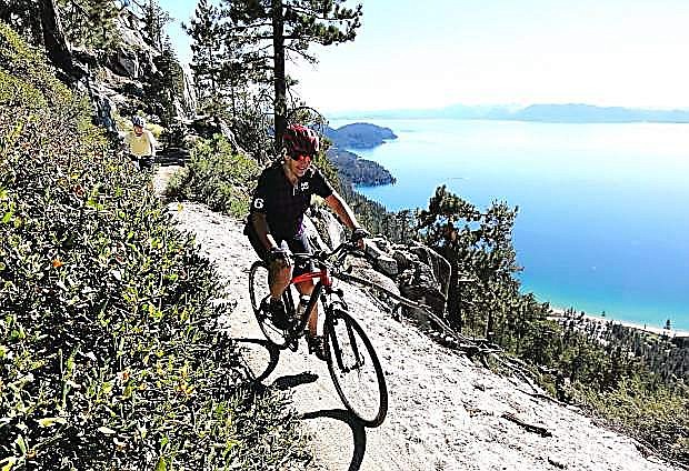 A mountain biker enjoys the Flume Trail along Lake Tahoe&#039;s East Shore. BikeTahoe.org recently launched to serve a growing group of tourists exploring the Tahoe region by bike.