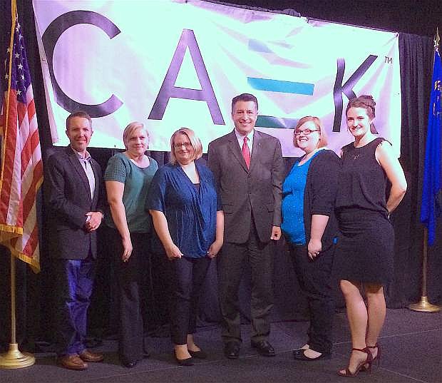 The women founders of CAEK are welcomed to Reno during a press conference Oct. 29, 2016, in the Eldorado Hotel Casino Resort. From left, are Reno City Councilman David Bobzein, CAEK COO Catherine Ganahl, CEO Anna Drachenbert, Nevada Gov. Brian Sandoval, VP of Marketing &amp; Strategic Planning Elizabeth Green, and VP of Sales &amp; Business Development Katie Lay.
