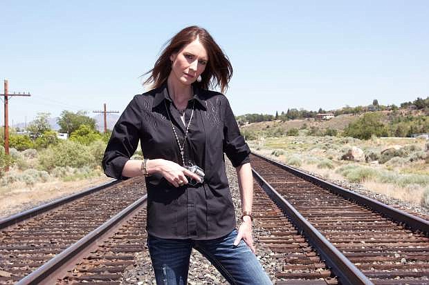 Lindsay Bradley models a shirt made by Silver State Apparel that allows wearers to conceal a small handgun.