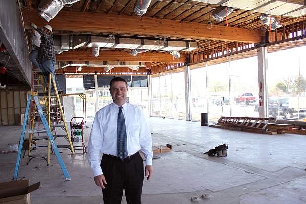 Reno Buick GMC Cadillac General Manager Ken Alexander in the dealership&#039;s old showroom, which is being gutted and renovated.