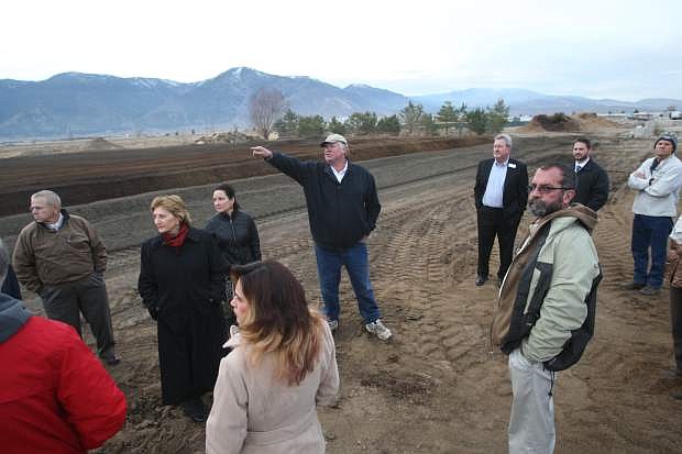 Dink Getty, owner of Great Basin Organics provides a tour of his compost operation to USDA officials and community members.