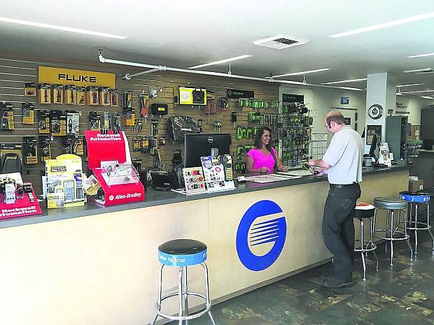 A Grove Madsen Industries staff member assists a customer at its Reno branch.