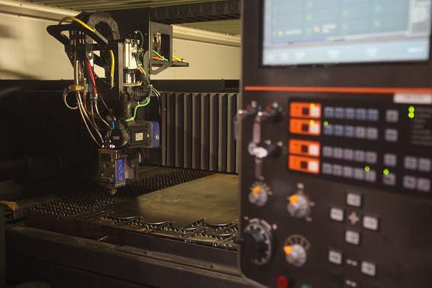 The Mazak 4000 watt fiber laser machine is used for cutting metals.