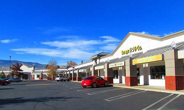 Owners Dennis Banks and Art Hinckley are looking to add boutique stores to Longley West Plaza. The shopping center now features Napa-Sonoma Grocery Company, also owned by Banks.