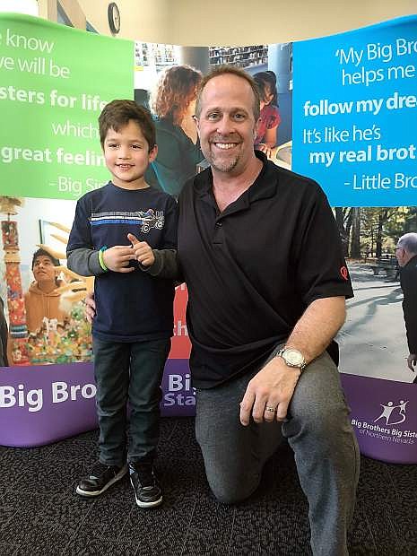 Colin Smith, owner of Roundabout Catering and a Big Brother, with his Little. He will be a featured chef at the Big Chefs, Big Gala.