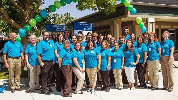 Staff gather to celebrate the opening of a new locations for Community Health Alliance, the largest provider of medical and dental services to low-income families in northern Nevada.