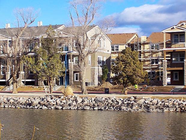 Work continues on the Silverwing Development project, Edge Water at Virginia Lake. Some of the apartments and condominiums in the complex have residents already, while construction will continue into 2016 on other buildings.