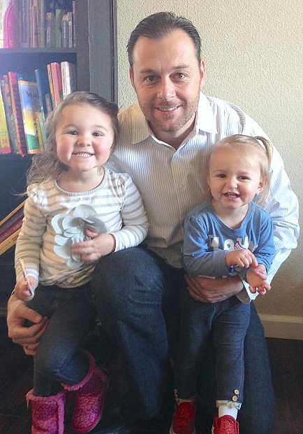 Garrett Hallenbeck and his daughters Emmi and Reese.