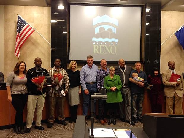 Graduates of the third Reno Works program stand with City and Volunteers of America Northern Nevada officials.