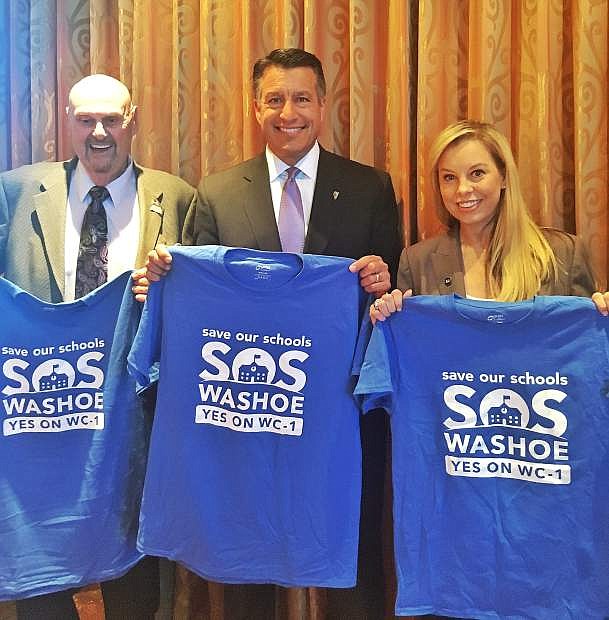 Nevada Governor Brian Sandoval (middle), Reno Mayor Hillary Schieve (right), and Sparks Mayor Geno Martini (left) announced their collective support for Washoe County Question 1 (WC-1), the ballot measure to invest in the construction and repair needs of our schools, after a meeting with The Coalition to Save Our Schools Wednesday, August 17.