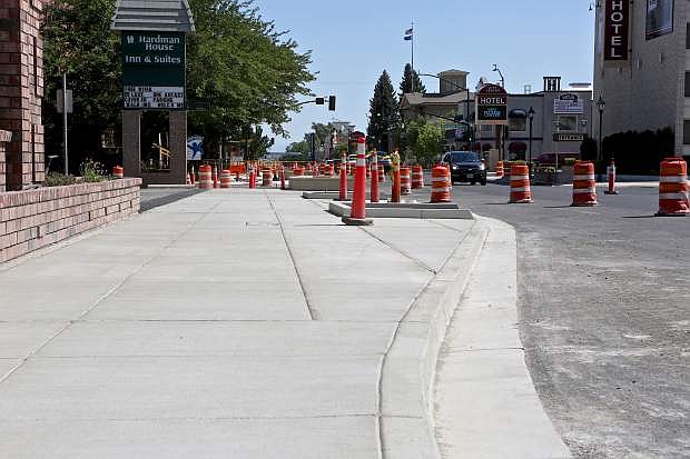 A sidewalk in its completed form is shown on the east side of Carson St. just south of William St.