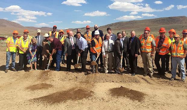 Gov. Brian Sandoval and a host of state, county and local officials gathered at the Tahoe Reno Industrial Center on Tuesday afternoon for the groundbreaking of the USA Parkway project.