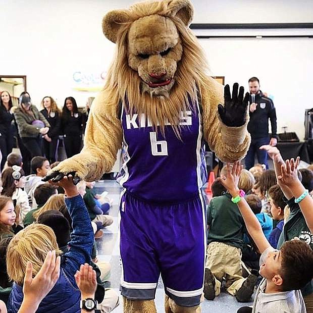 The Sacramento Kings&#039; mascot, Slamson the Lion attended a pep rally at a Reno-area elementary school for Bighorns/Kings Celebration Day on Nov. 2.