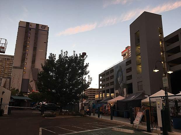 The blue parking garage, on the corner of South Virginia and Commercial Row, includes long-empty ground floor retail space that Whitney Peak will be remodeling. The corner is seen here during Street Vibrations activities.