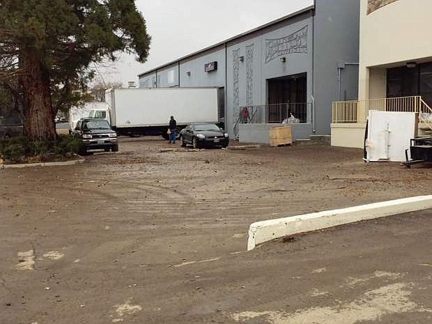 Warehouses in the industrial district of Sparks had mud to clean out following flooding last week.