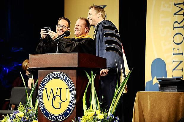 Officials pose for a selfie during WGU Nevada first graduation ceremony on May 21, 2016.
