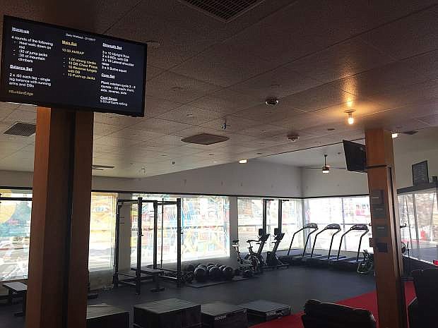 A view of the gym at Fizio. Pictured above on a monitor is a workout regimen designed for the athletes by Fizio&#039;s staff.