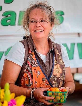 Loni Holley of Holley Family Farms at the Carson City farmers market. 