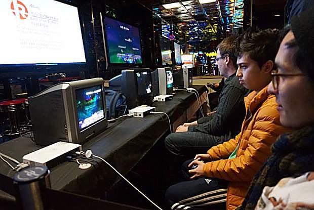 eSports players compete in a Super Smash Bros. melee during a tournament on Feb. 25 at Atlantis Resort Spa.