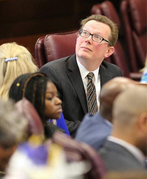 Senate member Ben Kieckhefer looks to the upper gallery in the Senate Chamber earlier this year during the Legislature.