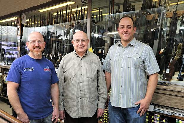 Todd, left, Marty and Dave Piccinini pause long enough for a photo at Mark Fore &amp; Strike, which the family has owned since 1967.