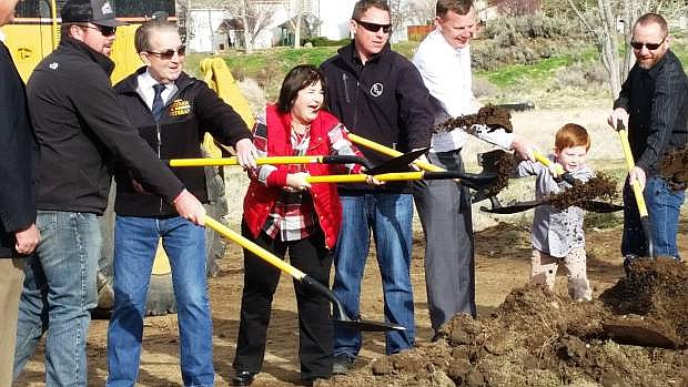 Mayor Bob Crowell, Supervisors Lori Bagwell and Brad Bonkowski, and developers Sam Landis, Rob McFadden and Mark Turner break ground on Mills Landing in March. The construction could come to a halt if bills in the legislator restore old defect litigation laws.