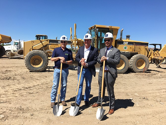 City of Sparks Council Member Ron Smith, Chairman and Chief Executive Officer of S3 Development Blake Smith and City of Sparks Council Member Donald Abbott break ground on a new 280-unit luxury apartment complex in Sparks. 