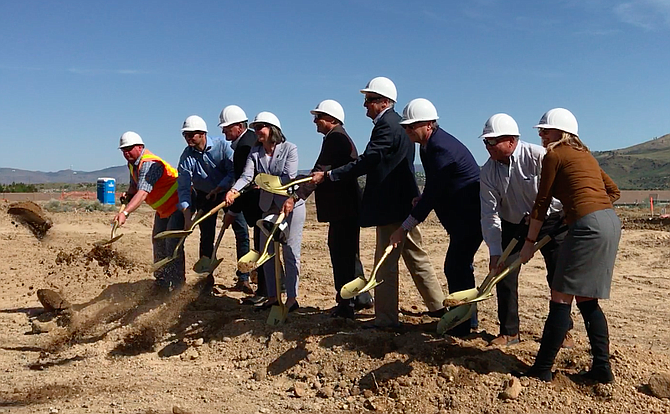Officials from the City of Reno, Guardian Capital, LandCap Investment Partners and others involved in the development of the Vida luxury apartments celebrate the start of construction.