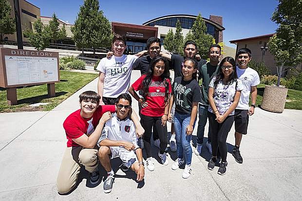 A group of Truckee Meadows Community College students pose in front of the campus. TMCC is one of four Nevada community colleges that will benefit from the Nevada Promise Program.