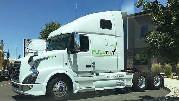 This Volvo tractor belonging to Full Tilt Transportation has been upgraded with computerized features that improve gas mileage and safety.