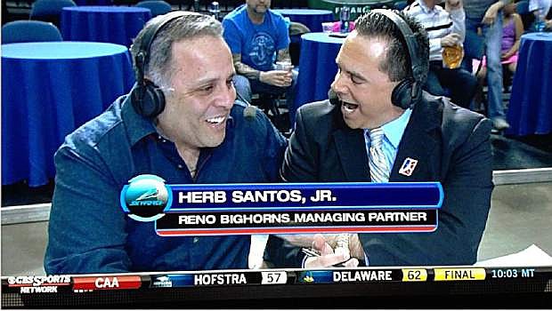 Herb Santos, Jr. (left) is interviewed during a Reno Bighorns game.