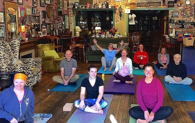 Community Yogi, a Carson City startup associated with Adams Hub, offers classes at nontraditional locations, including this class at Comma Coffee in Carson.