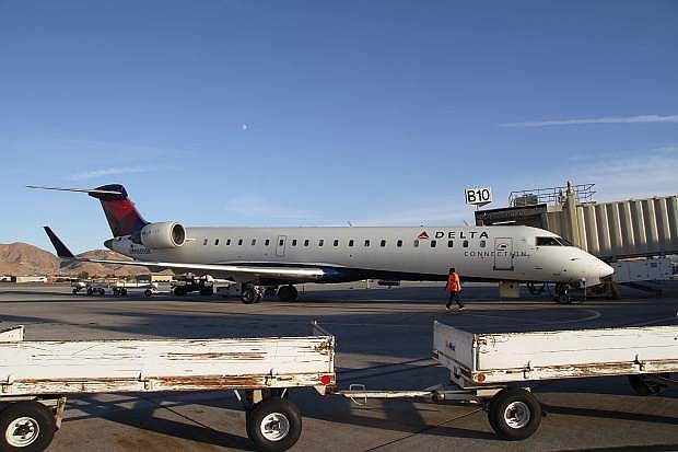 A Delta flight lands at the Reno-Tahoe Airport on Oct. 11.