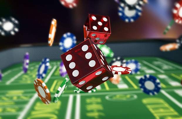 close up view of a craps table with dices and fiches (3d render)